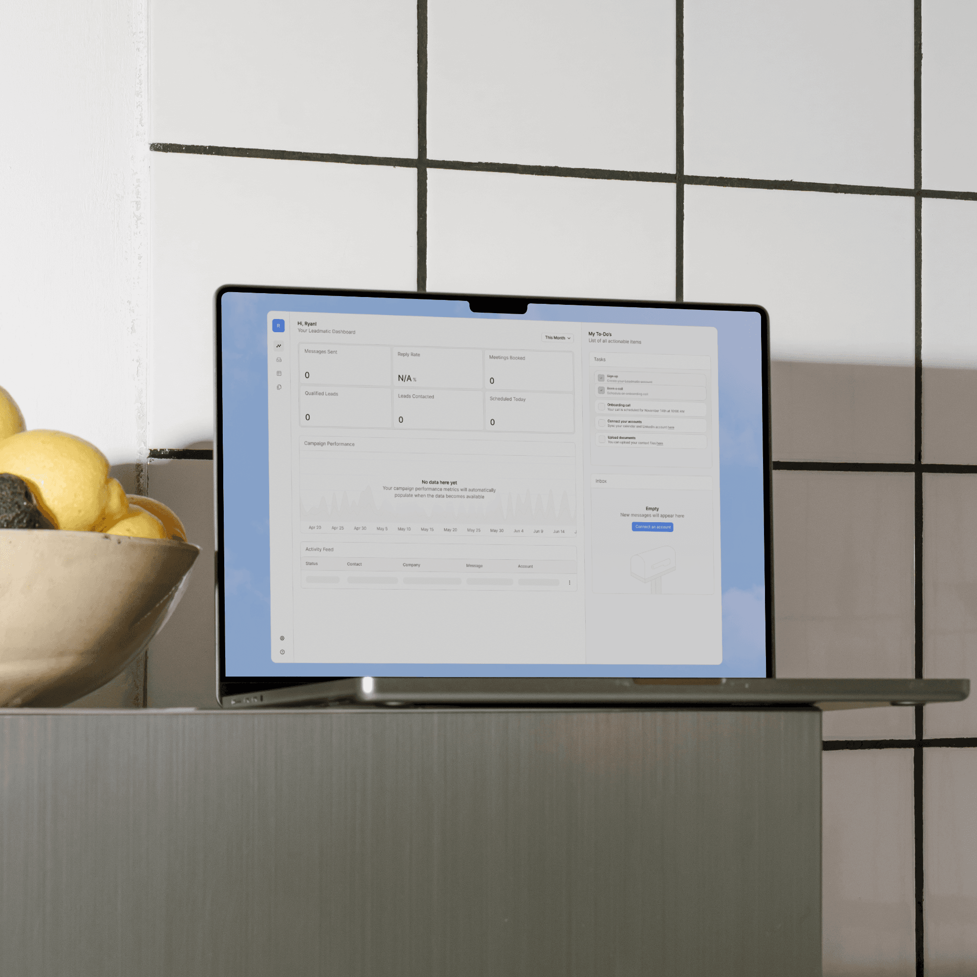 Leadmatic shown on a laptop in a kitchen
